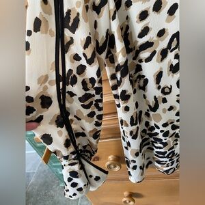 Animal print blouse with key holes in seamed long sleeves with bell cuffs, sz 1